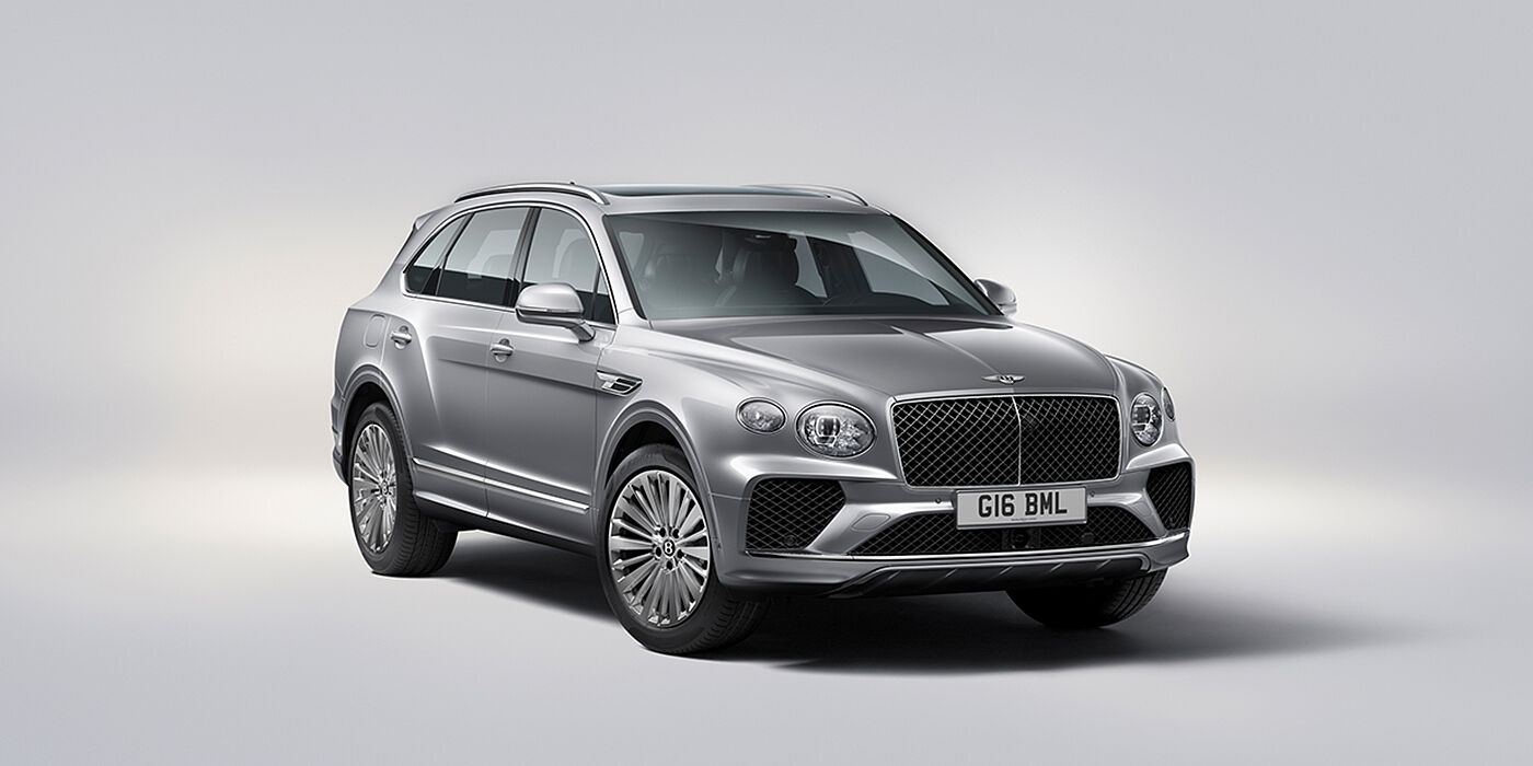 Bentley Ho Chi Minh Bentley Bentayga luxury SUV front three quarter view in Moonbeam paint with matrix grille and 21″ 5 spoke painted wheels