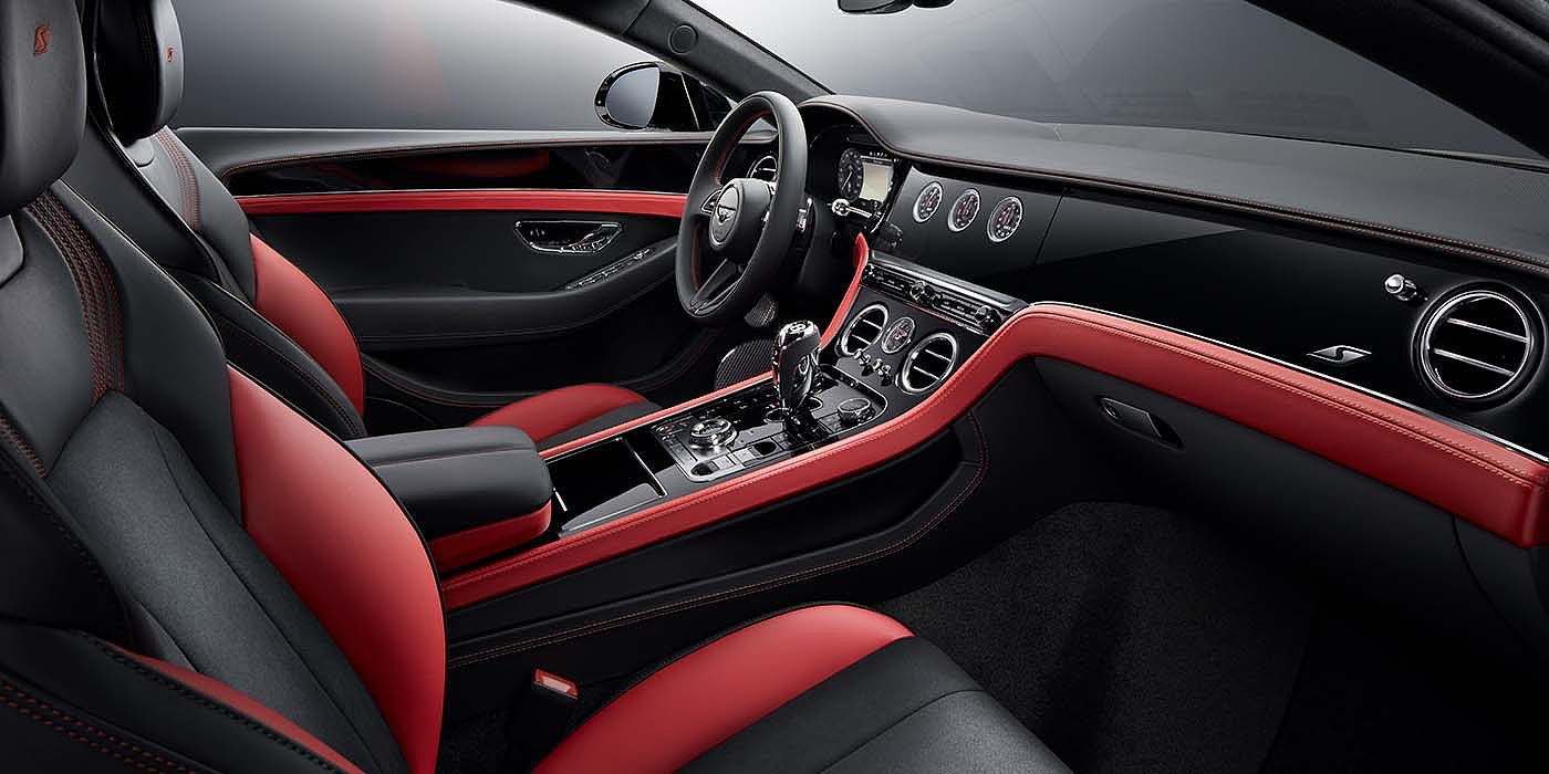 Bentley Ho Chi Minh Bentley Continental GT S coupe front interior in Beluga black and Hotspur red hide with high gloss Carbon Fibre veneer