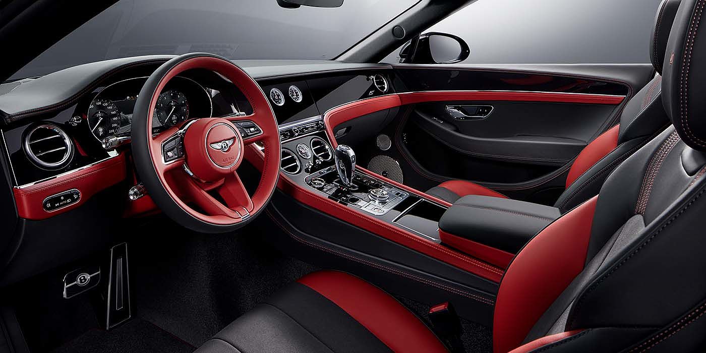 Bentley Ho Chi Minh Bentley Continental GTC S convertible front interior in Beluga black and Hotspur red hide with high gloss carbon fibre veneer