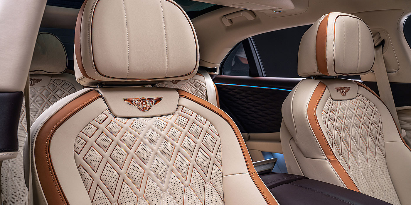 Bentley Ho Chi Minh Bentley Flying Spur Odyssean sedan rear seat detail with Diamond quilting and Linen and Burnt Oak hides