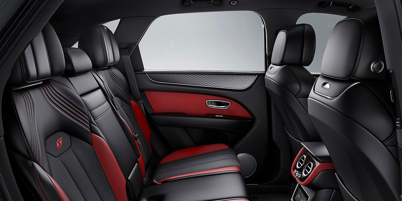 Bentley Ho Chi Minh Bentey Bentayga S interior view for rear passengers with Beluga black and Hotspur red coloured hide.