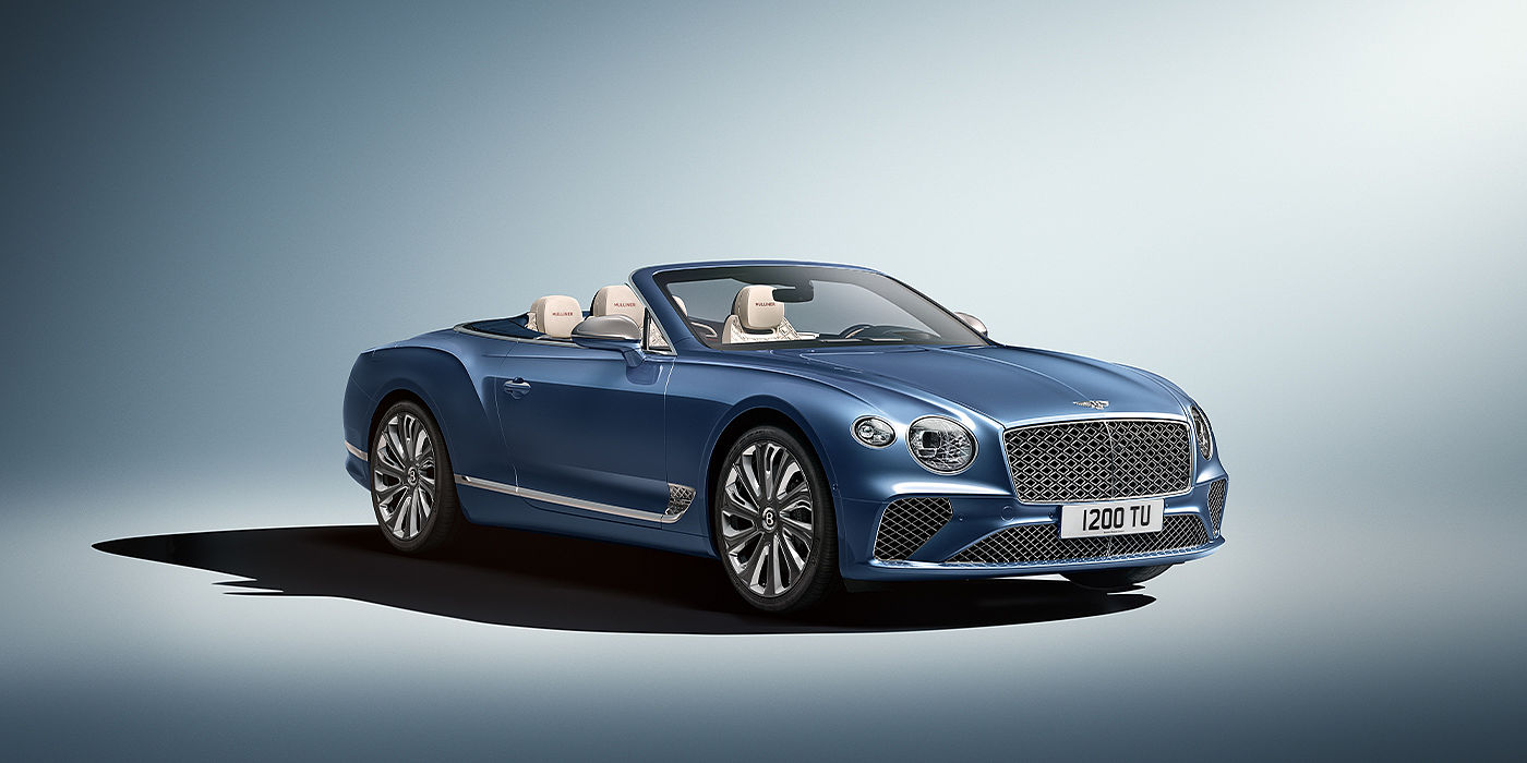Bentley Ho Chi Minh Bentley Continental GTC Mulliner convertible in Peacock blue paint front 34