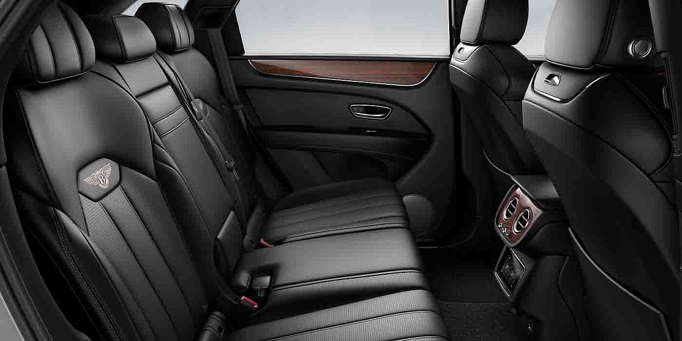 Bentley Ho Chi Minh Bentley Bentayga EWB interior view for rear passengers with Beluga black hide.