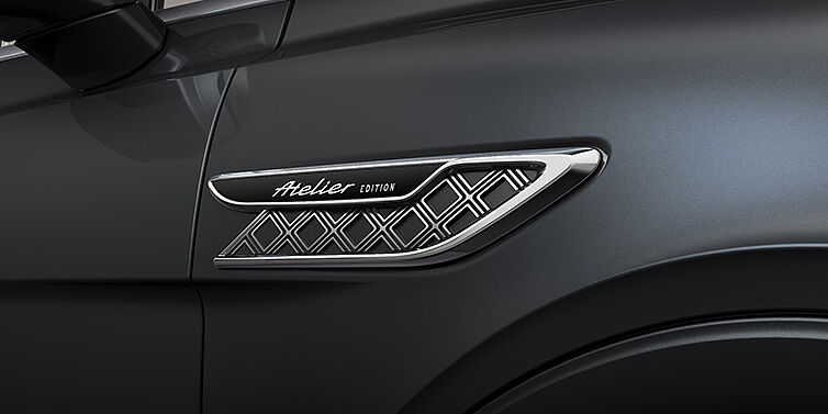 %dealerCompanyName% Bentley Bentayga EWB SUV Atelier Edition side vent detail with chrome surround and diamond-knurled black mesh, Atelier Edition badge