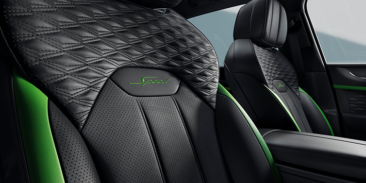 Bentley Bentayga Speed interior seat with diamond-quilted leather, Hyper Green contrast stitching, and embroidered “Speed” logo detail.