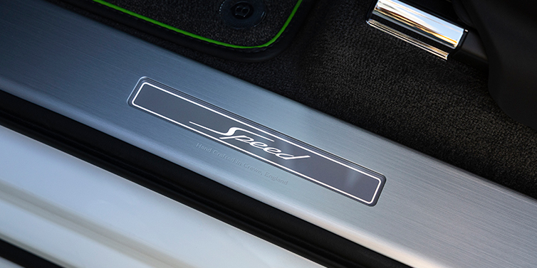 Bentley Bentayga Speed SUV sill plate detail engraved with “Speed” and “Hand Crafted in Crewe, England”